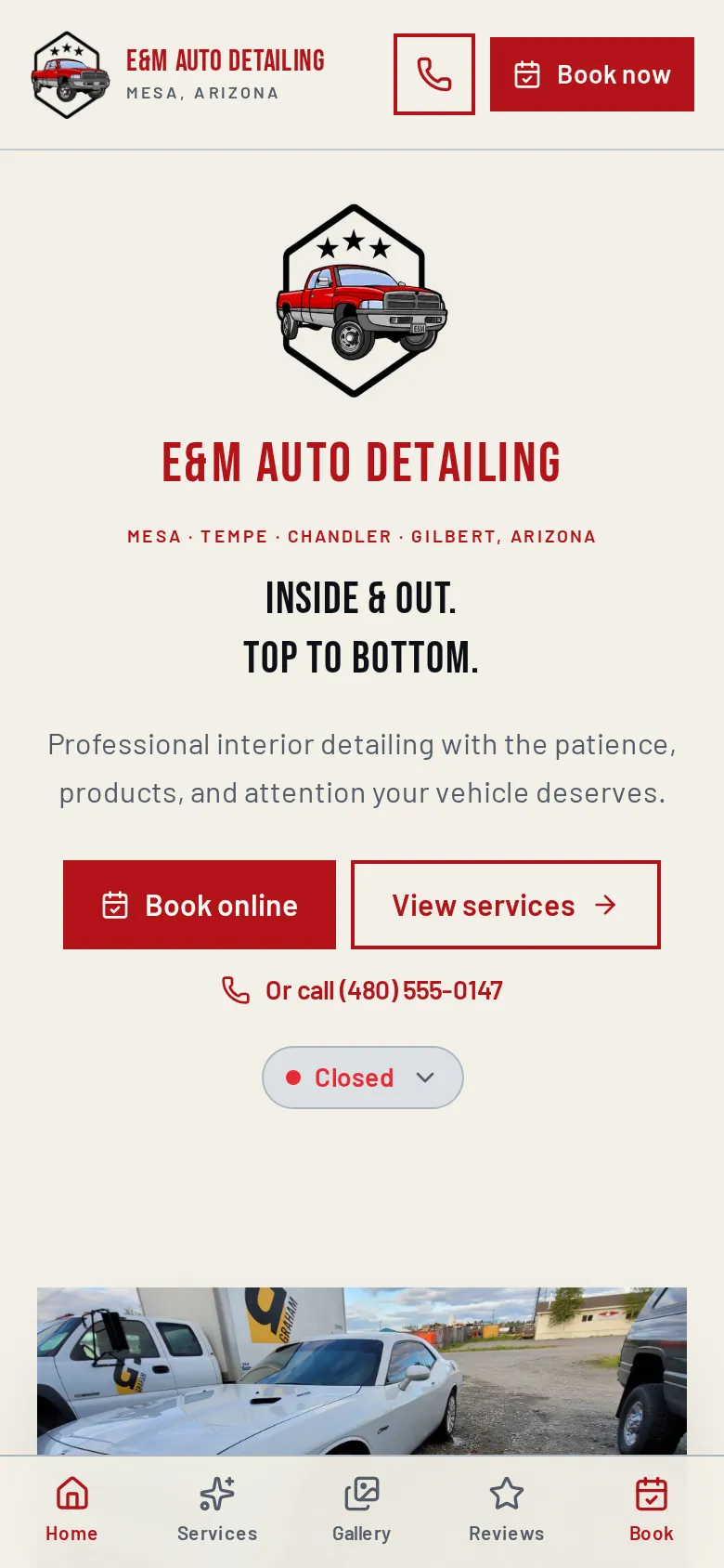 E&M Details website on a phone