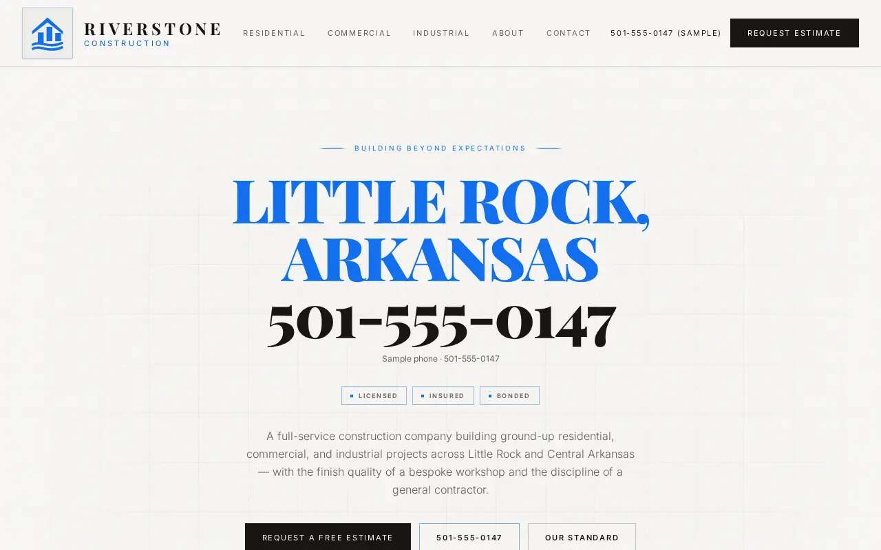 Riverstone Construction website on a laptop